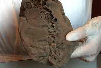 The one-piece laced moccasin could have been for a man or a woman. 