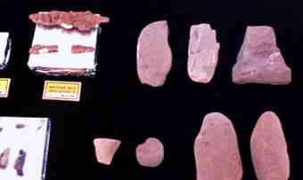 Iron implements and stone tools.