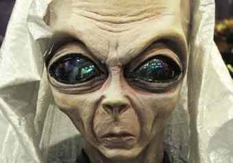 'Al the Alien' casts a menacing glare Thursday, July 1, 2010 as the Galactic Market at the Roswell Convention & Visitors Bureau in Roswell, New Mexico