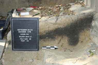 These bits of black are what remains of a 20 cm thick support pole that held the structure up. Photo courtesy Professor Chris Ellis. 