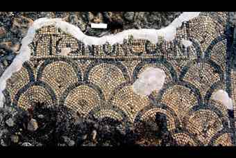 A mosaic inside the remains of a Samaritan synagogue, built some 1,500 years ago, which has reently been uncovered in the northern Israeli town of Beit Shean, in the Jordan Valley. The remians show the synagogue and a farmstead that operated in the Late Byzantine period and the mosaic reads, 'this is the temple.' 