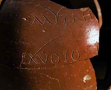Detail of the dedication to the god Mithra on a Dechelette 72 vase, manufactured at Lezoux - - Image Copyright Hervé Paitier INRAP