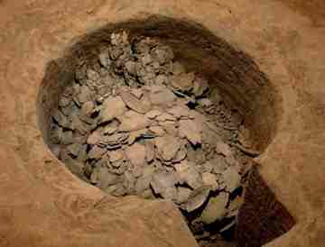 Oracle bones are seen in a pit at the Yin Ruins in Anyang, Central China's Henan province.