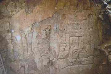 Large high-relief carving was found showing a decapitating figure.