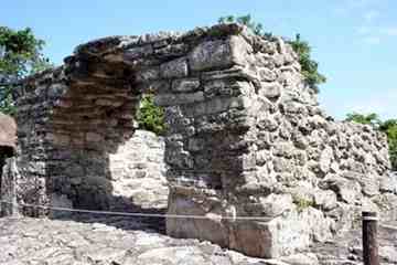 A welcoming arch protects an altar on an ancient road leading into the ceremonial center at the Mayan Ruins in San Gervasio in Cozumel, Mexico. Many statues of the fertility goddess Ixchel were found here and are still being discovered at more than 40 temples on the island.