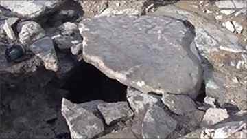 A stone slab forms the roof of one of the chambers.