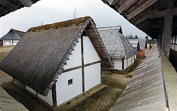 A reconstruction of a celtic settlement at the Heuneburg hill fort site Photo: IMAGEBROKER