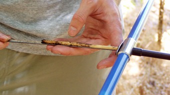 Extracting a core from an increment borer, a standard tool used by dendrochronologists. [Photo by Tim De Chant]