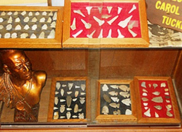 The Crete Public Library has a unique collection of arrowheads, axe, bead work and more on display from January through March in the Crete Historical Society’s cabinets.  The display is from the collection of Les and Carol Tucker and Ray Mattox, whose father, John Mattox, was an avid Indian arrowhead collector.  The Tuckers found many arrowheads in the plowed farm fields of Crete where the Pottawatomi Indians used to hunt and camp.  <br />Supplied photo          
