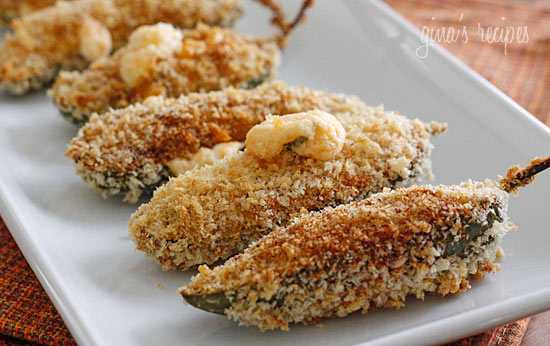 With Superbowl around the corner, these lightened up Jalapeño Poppers will make the perfect party appetizer. Jalapeño peppers stuffed with cheese, coated with seasoned panko, then baked not fried. You won't miss the full fat version!