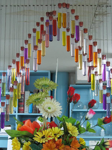 ceiling decoration made of test tubes filled with colored water