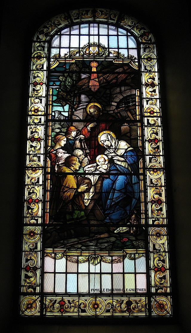 stained glass window at the Notre-Dame de Québec depicting the birth of Jesus