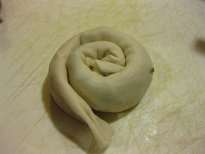 photo of the dough rolled up in a coil