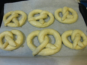 dough shaped into pretzels.