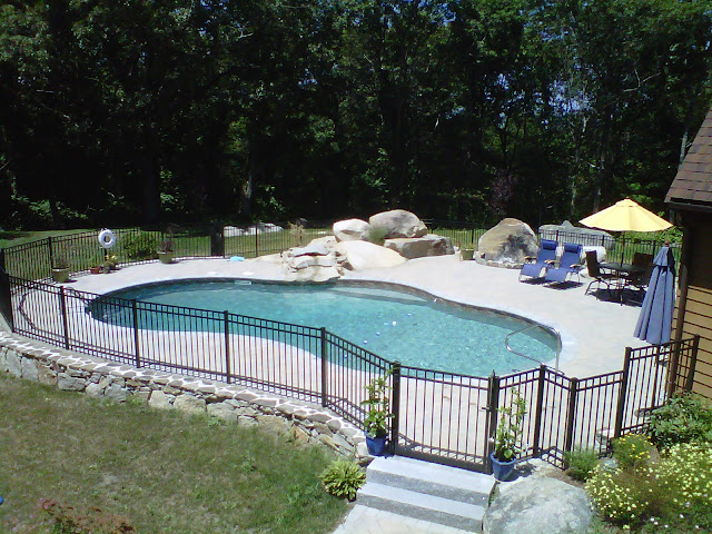 oasis vinyl liner pool with waterfall and paver patio Gloucester MA