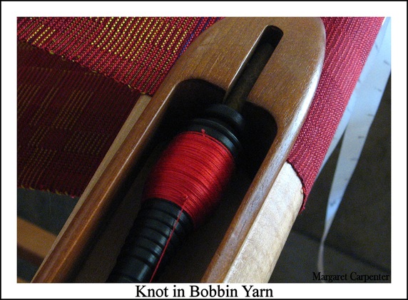 Knot in bobbin yarn