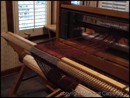 warp at back of loom