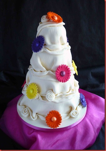 4-tier-Chocolate-ruffle-abd-Coloured-Gerbera-wedding-cake