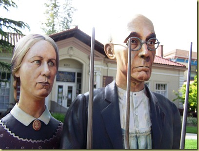 A close up of the man and woman faces.  Their detail and life like look is impressive. 