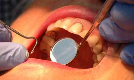 Patient being treated with colour at the dentist