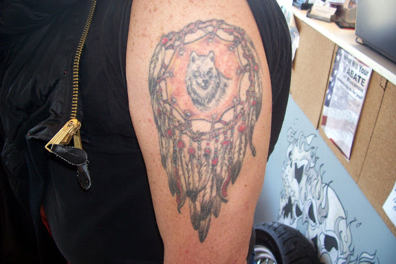 Natural animal tribal sleeve arm tattoo