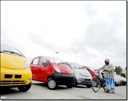 tata nano s lined up man with cycle looking hyderabad