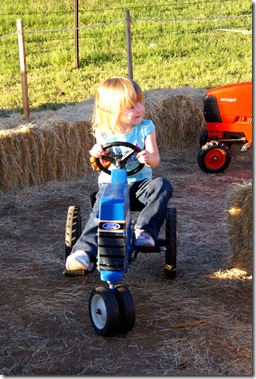 Brooklyn Riding a Tractor     