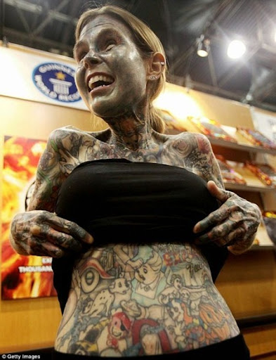 Lets start with number 1, Julia Gnuse, the most tattooed woman in the world.
