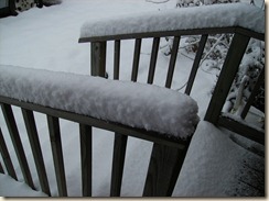snow on porch