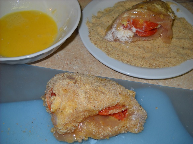 stuffed chicken dipped in egg and bread crumb mixture 