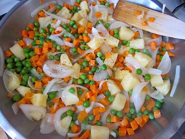 frozen veggies added into pan to sauté 
