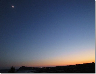 16.  Moon, planet, sunset