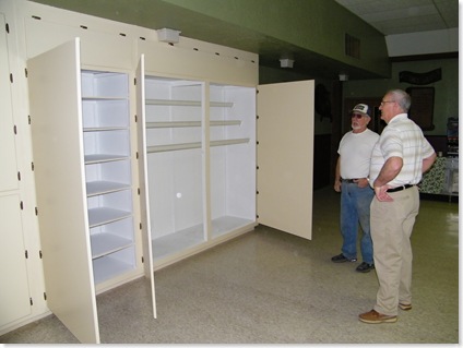 George Reid showing Don the cabinets he built at SA SOWERS project.