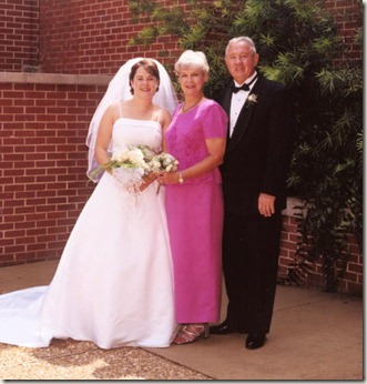 sonya and parents in courtyard