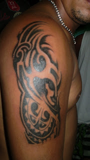 Decorative flash tribal arm tattoo, photos and image