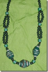 green ceramic necklace detail