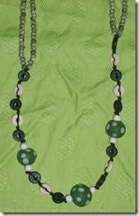 green polka dot necklace detail