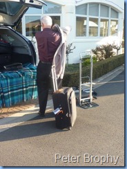 Peter Brophy unpacking his car at the Ocean Shores Village where the Concert took place.