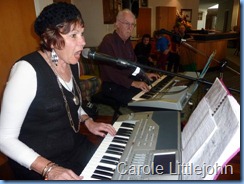 Carole Littlejohn is an accomplished singer as well and here you see her singing along with the keyboard playing