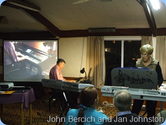 Another view of John Bercich and Jan Johnston duetting. The big screen was focussed on John playing our Clavinova