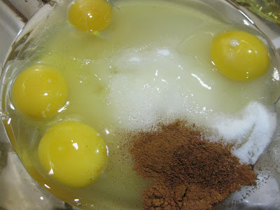 photo of the eggs, sugar and spices in a bowl