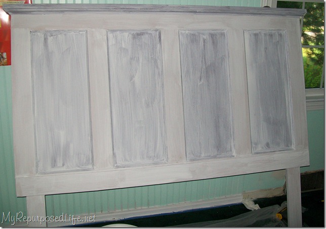how to make a headboard out of an old door old door into a headboard