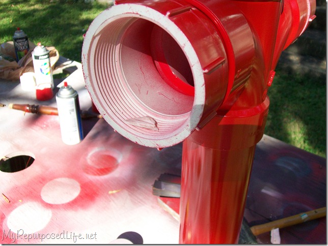 red pvc fire hydrant yard art