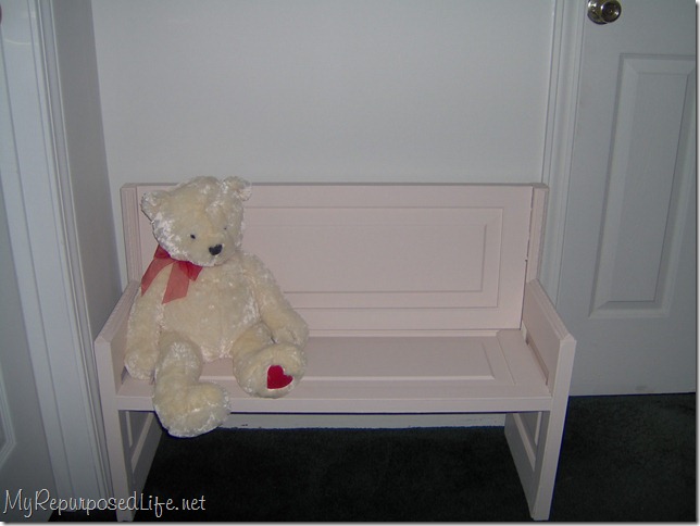 door repurposed into a bench door repurposed into a bench