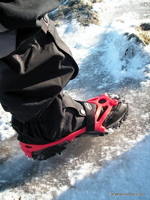 Pogu Spikes - foot on icy rocks
