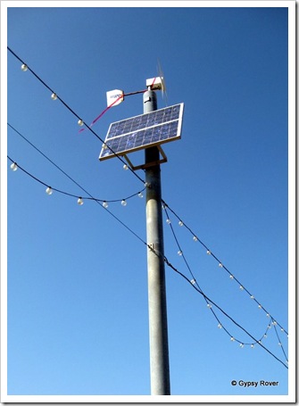 Energy saving at Paignton. Solar panels and wind turbines power the beach light's.