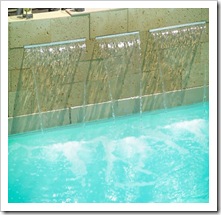 charming-swimming-pool-fountain-powerfall-by-zodiac-pooclare-3-554x369