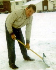 Clayn shoveling snow