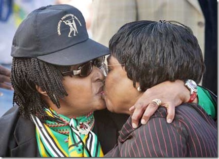 Murdock Alan picture of Winnie Mandela left kissing ex health minister Manto TshabalalaMsimang R