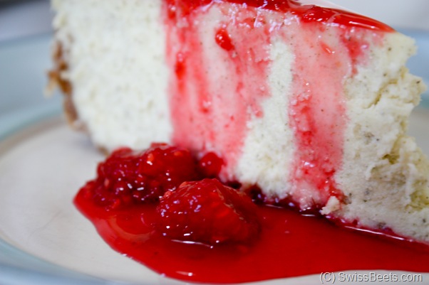 raspberry sauce on cheesecake